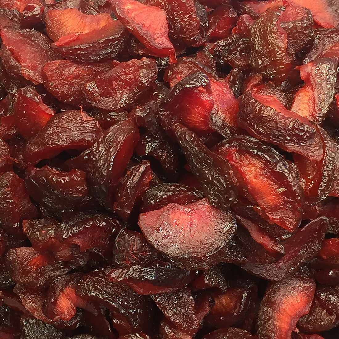 A pile of dried red apricots, one of the richest fruit sources of potassium