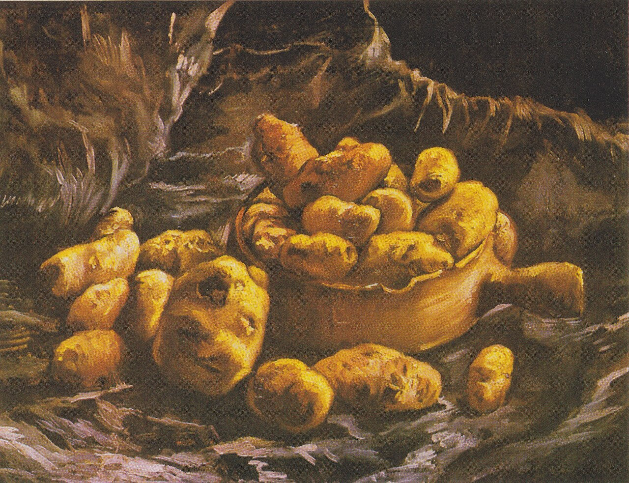 Van Gogh still life of potatoes in an earthen bowl against a dark background