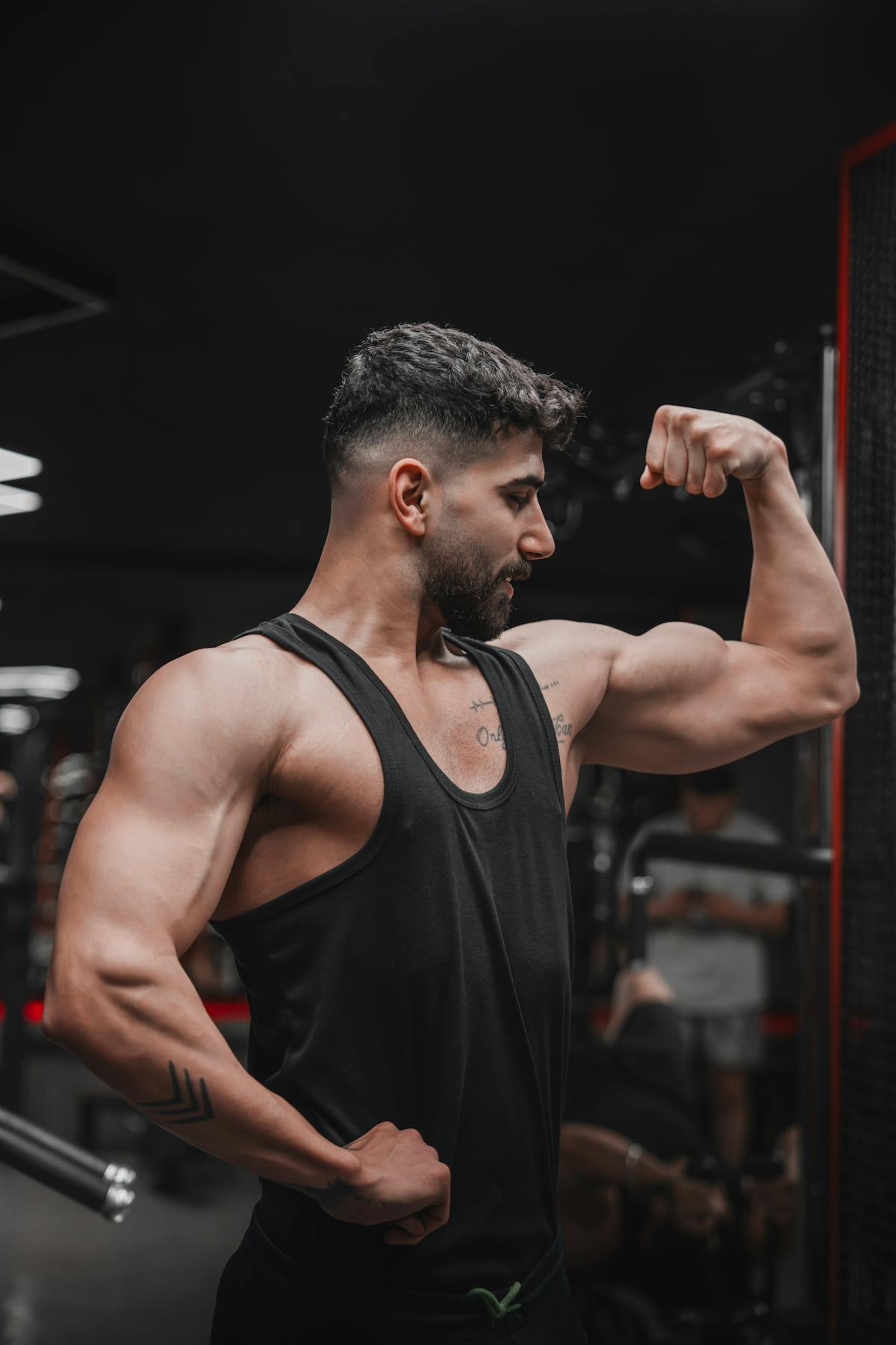 muscular man dark gym