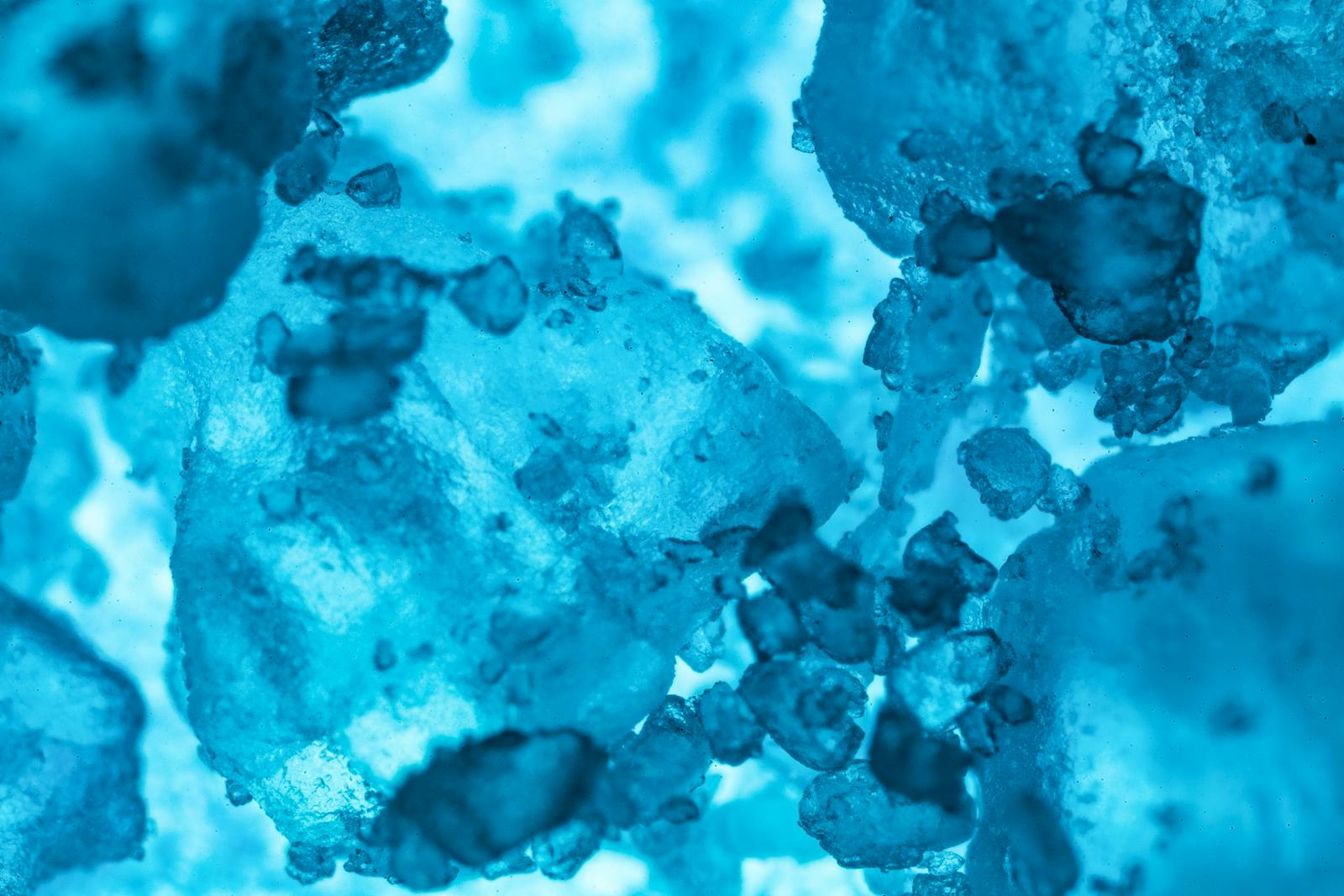 Mineral crystals on dark background representing magnesium supplement forms
